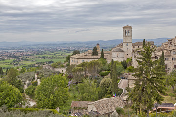 Fototapeta na wymiar Assisi, Italy. View of the city and its surroundings on the mountainside