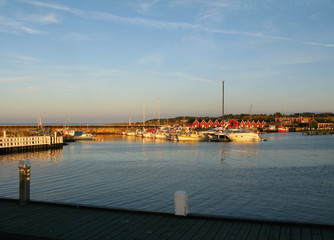 Laesoe / Denmark: Fishing and leisure boats in the small fishing port of Vesteroe Havn in the deep October sun