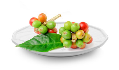 coffee beans in plate on white background