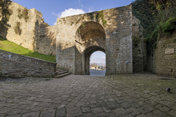 Fototapeta na wymiar Porta di Docciola, walls of Volterra, Pisa, Tuscany, Italy