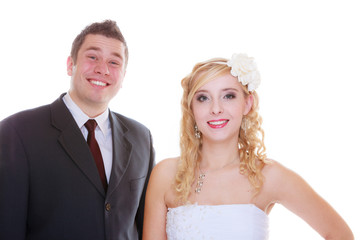 Happy groom and bride posing for marriage photo