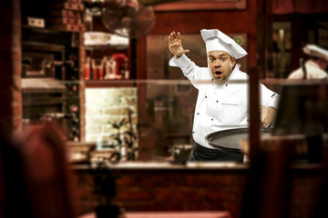 Cook chef in his own small business of restaurant. 