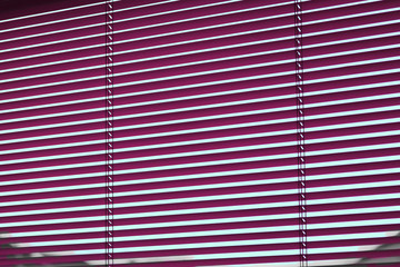 Horizontal window blinds in red