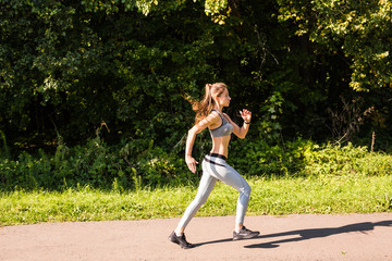 healthy lifestyle young fitness woman running outdoors