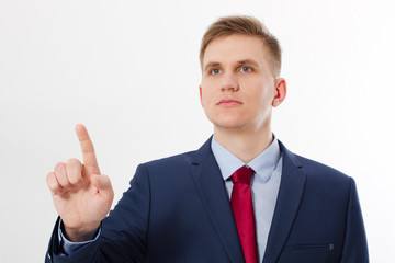 Stylish Businessman point on virtual screen isolated on white background. Selective focus on pointing finger. Business success concept