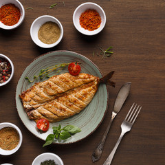 White fish juicy fillet grilled on barbecue