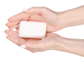 Soap in female hands isolated