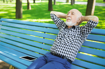 Relaxed senior man outdoors
