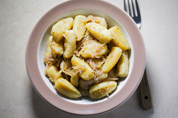 Gray dumplings with sour cabbage