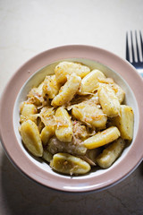 Gray dumplings with sour cabbage
