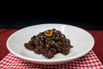 wok fried pork stir fry with sweet peppers and chinese vegetables