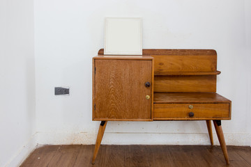 White frame mockup in room. Poster product design styled mockup. Empty frame mockup.