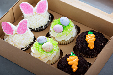 Assortment of easter cupcakes in a box