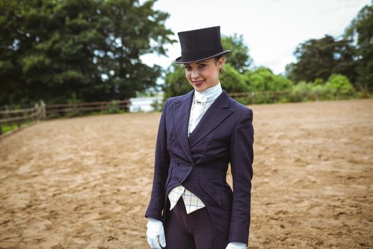 Smiling jockey posing for camera 
