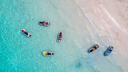 Sea aerial view,Top view,amazing nature background.The color of the water and beautifully bright.Azure beach with rocky mountains and clear water of Thailand ocean at sunny day.