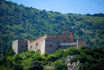Fototapeta na wymiar Fort Liberia overlooking the pretty walled town of Villfranche de Conflent in the south of France. This medieval city dates back to the 11th century