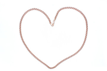 Gold chain on a white background. Gold