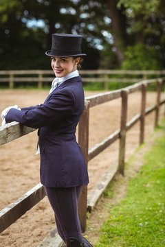 Smiling jockey posing for camera 