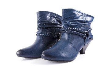 Female blue leather boots on white background, isolated product, comfortable footwear.