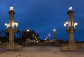 Fototapeta na wymiar Empty bridge with large decorative lamp posts