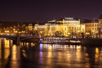 Fototapeta premium Rudolfinum concert hall at the Vltava riverbank by night