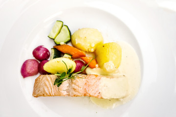 french cuisine dish with tomato and salmon