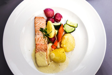 french cuisine dish with tomato and salmon