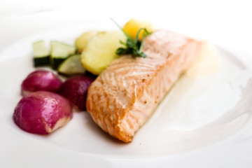 french cuisine dish with tomato and salmon
