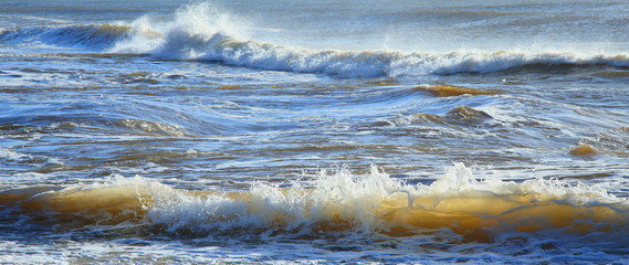 Sea waves during high tide