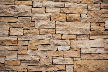 Stone wall background Wall made of cavern rock