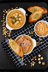 Beans vegetarian soup with bacon and croutons
