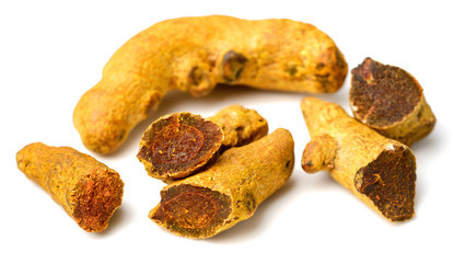 dried turmeric isolated on the white background