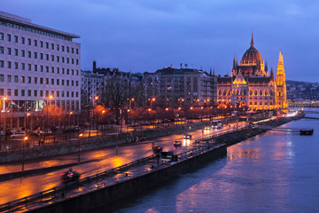 Fototapeta na wymiar A view of Budapest by night with Danube river and Parliament, Hungary, Europe