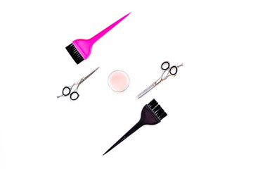Professional hairdressing tools in beauty saloon. Sciccors, brushes on white background top view copy space