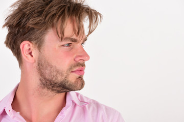 Obraz premium Man with interested serious face isolated on white background