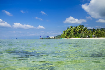 Beautiful tropical beach with white sand and clear blue water