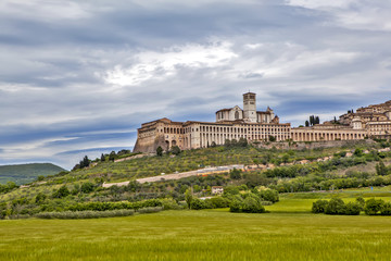 Fototapeta na wymiar Assisi, Italy. View of the city and its surroundings on the mountainside