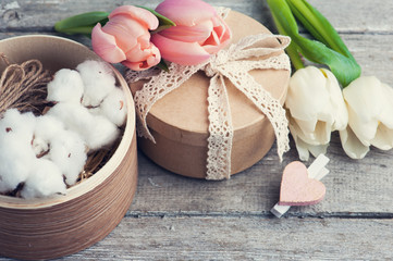 Pink white tulip flowers and craft gifts