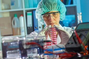female technician in laboratory research of cancer diseases