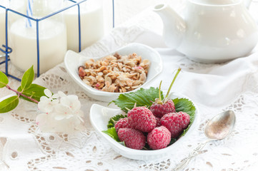 Ripe raspberry from the city garden for Breakfast with tea and homemade jam.