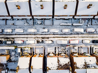 Aerial view of snow covered traditional housing suburbs in England. Snow, ice and adverse weather...