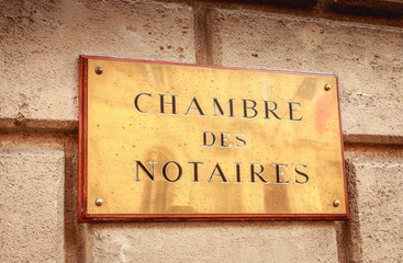 copper plate where it is written chamber of notaries