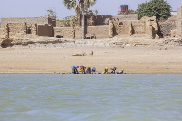 Mud houses along the shores of the Niger River, Mali