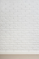 Fototapeta premium white brick wall with floor indoor for texture or background