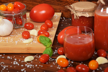 healthy tomato juice with basil made of sweet cocktail tomatoes