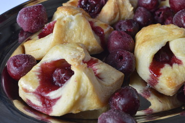 Delicious, shortbread cookies bows with frozen cherries