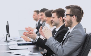 Fototapeta premium staff applauded the speaker at the meeting