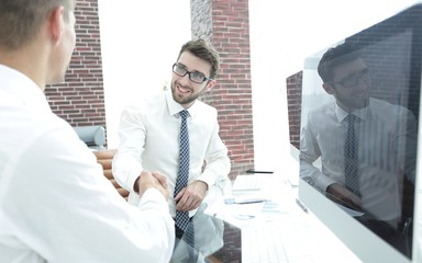 handshake of a businessman and accountant