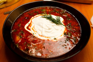 Borscht with sour cream and herbs.