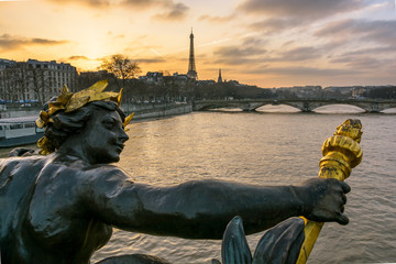 View from behind of one of the Nymphs of the Seine ornamenting the downstream keystone of the Pont...